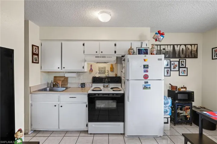 Free standing cabinets could be placed to the right of the refrigerator providing additional storage if needed.