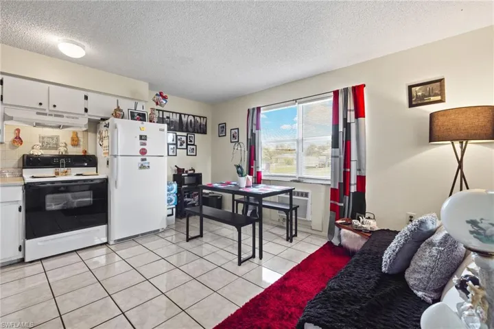 Open concept eat in kitchen/living room area.