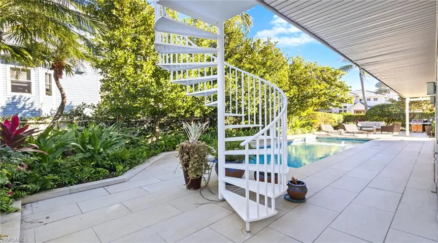 Outdoor pool featuring a patio area and outdoor seating