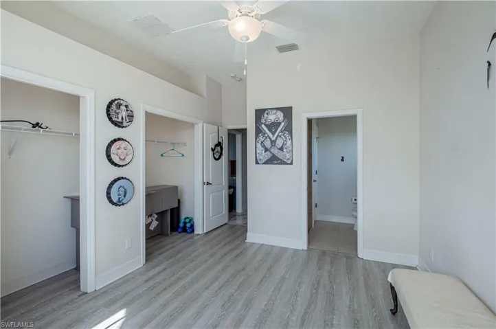 Guest bedroom #1 looking in from hallway and private guest bathroom
