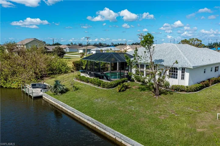 Aerial of back of house and canal