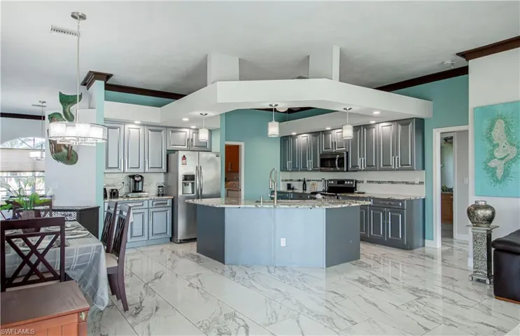kitchen and eat in kitchen area looking in from family room