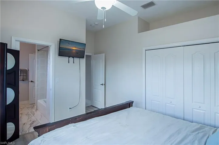 Guest bedroom #2 looking towards bathroom and hallway