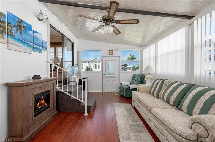 Family room area with fireplace and great space for watching television.
