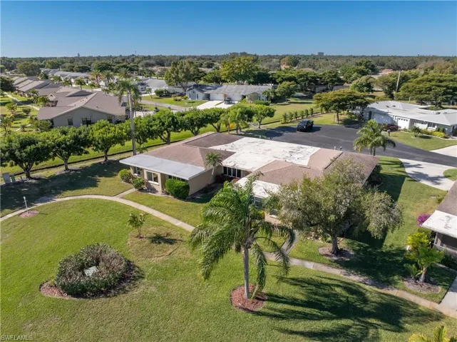 View of property location with nearby suburban area
