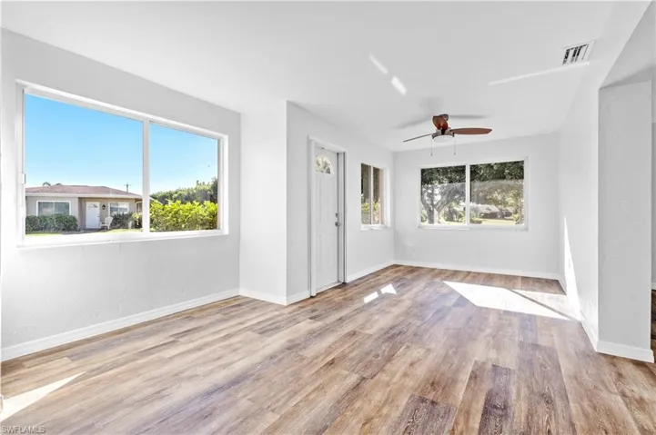 Foyer featuring light wood-type flooring and ceiling fan