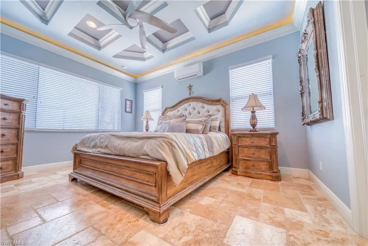 Primary bedroom overlooks lake