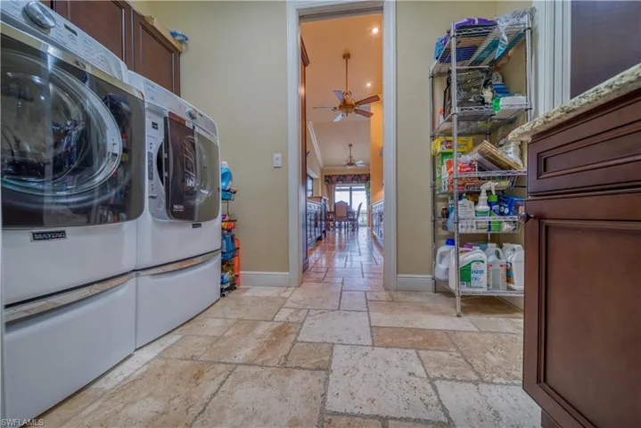 Laundry accessible thru primary bedroom