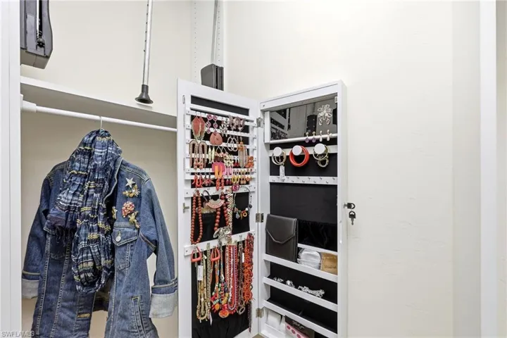 Walk-in closet with built-in organization and accessible storage, designed for easy reach and everyday functionality