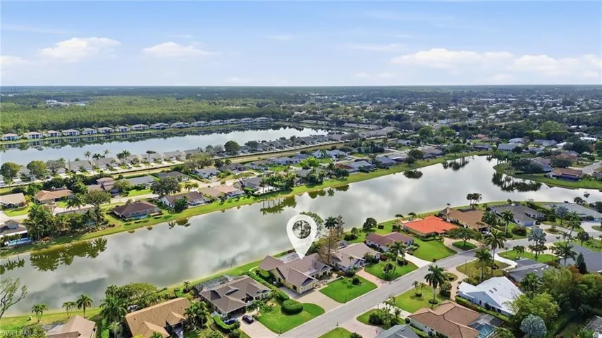 Aerial view showing lakefront location within Kings Lake, just minutes to downtown Naples and the beach
