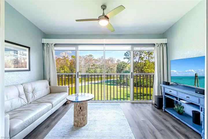 All seasons room with gorgeous lake and preserve views