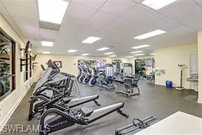 Exercise room featuring a drop ceiling
