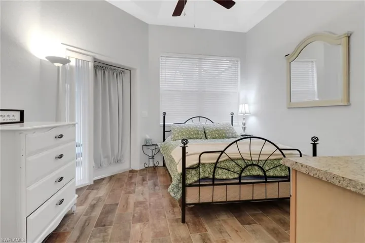 Bedroom with wood finished floors