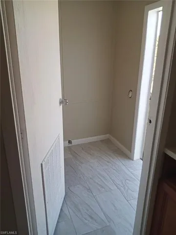 Empty room with baseboards