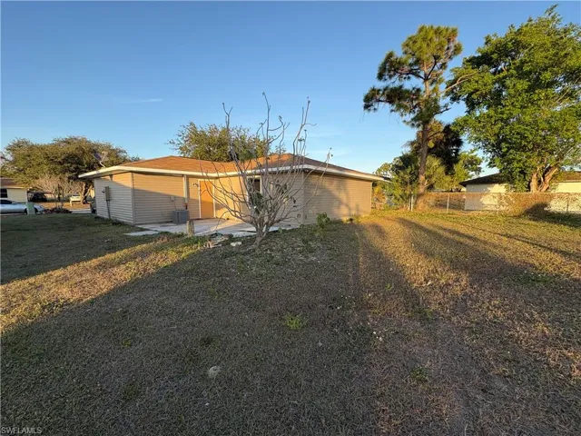 Back of property with a patio