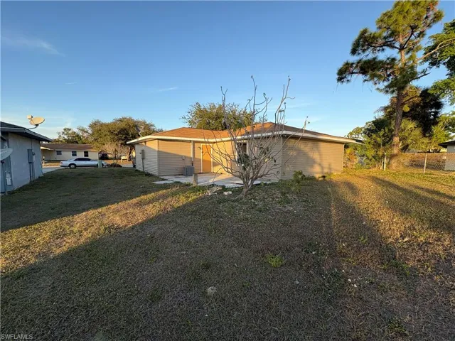 Rear view of property with a patio