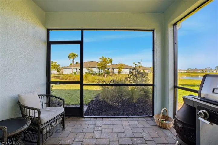 Sunroom / solarium with a residential view