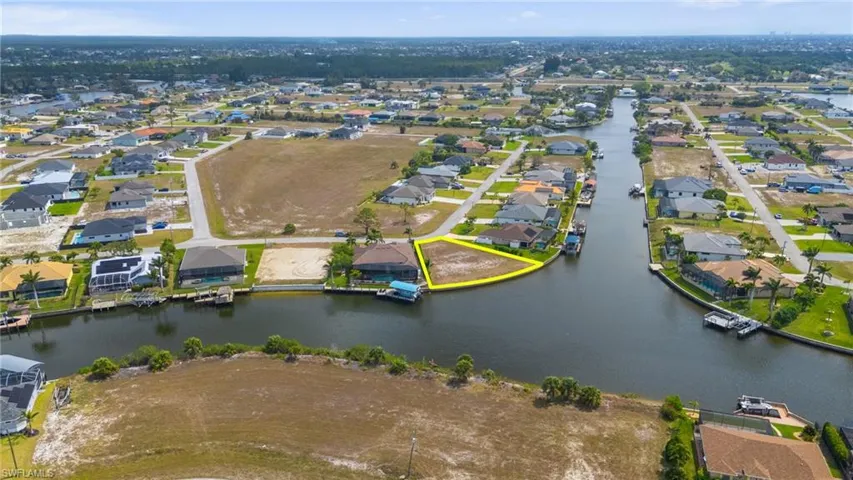Aerial view with a water view and a residential view