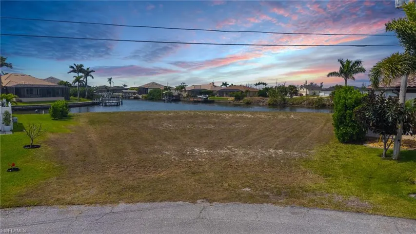 Property view of water with a residential view