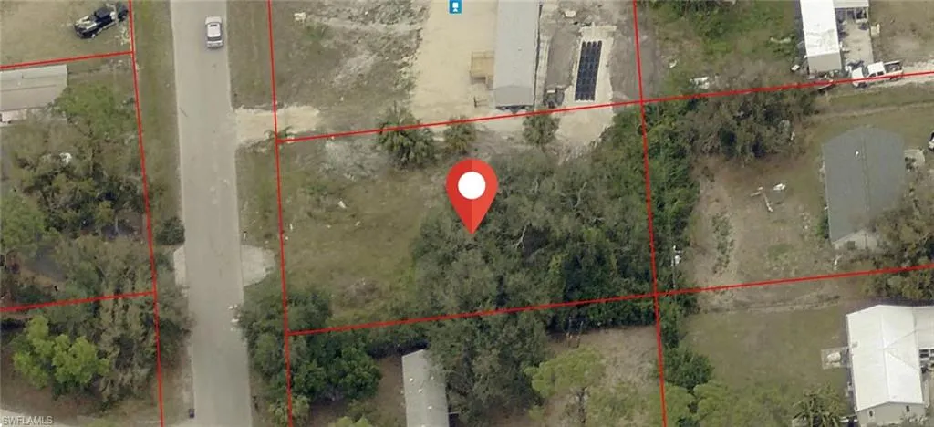 Aerial overview of property's location with property boundaries highlighted