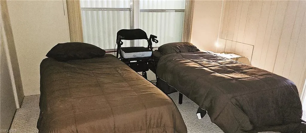 Bedroom featuring carpet
