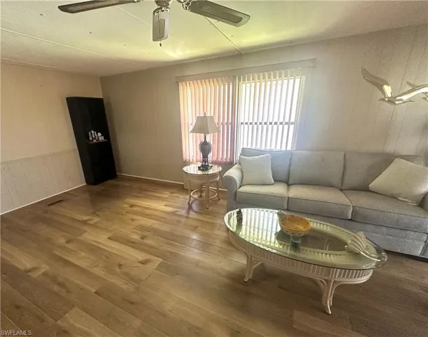 Spacious living room has plenty of room for a office nook,