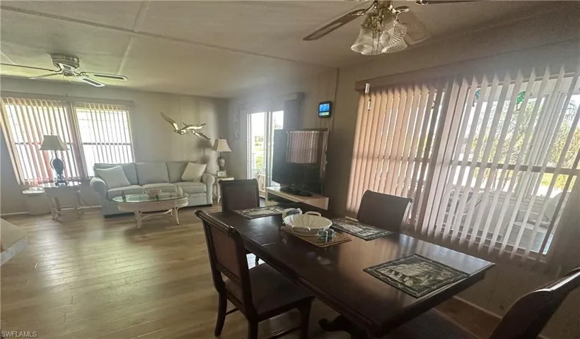 Open floor plan and front door leads out to the front Sun Room.