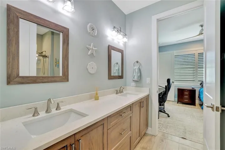Full bathroom with a sink and double vanity