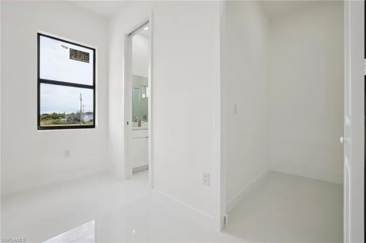 Hall featuring baseboards