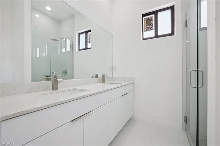 Full bath with double vanity and a stall shower (Similar Model)