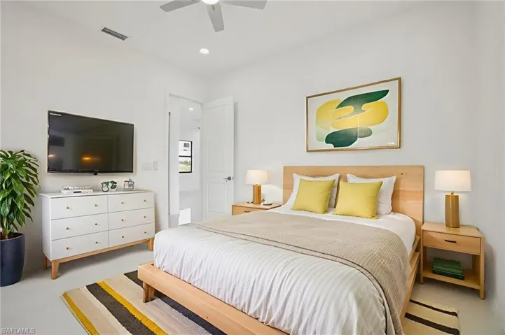 Virtually staged- Bedroom featuring recessed lighting and a ceiling fan