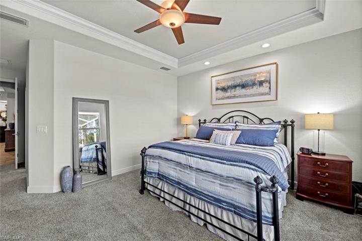 Master bedroom, hall leads to ensuite bath and walk-in closet