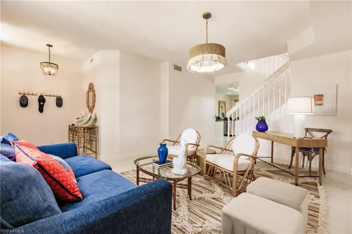 Living room with a notable chandelier