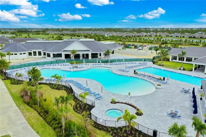 View of pool featuring a patio and a community hot tub