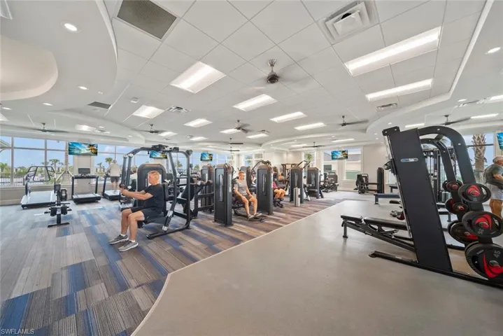 Workout area featuring ceiling fan