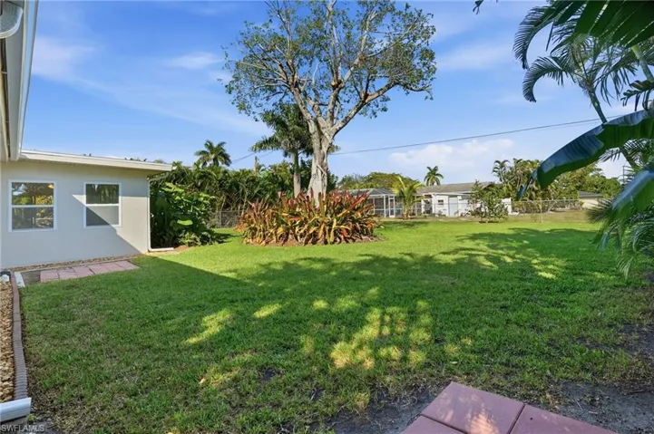 View of fenced backyard