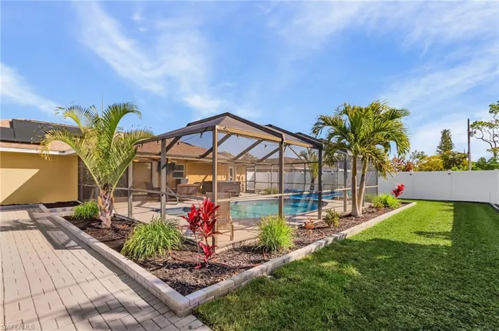 Nice play area for the kids or dog run for the family pet.  Property is completely fenced in.