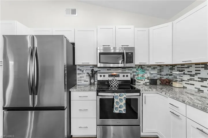 Light and bright kitchen makes it a pleasure to work in.