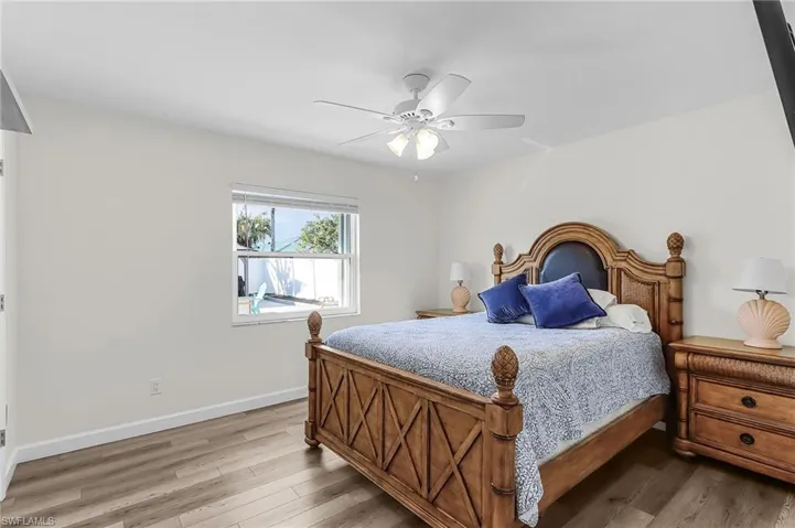Guest bedroom facing the rear of the home.