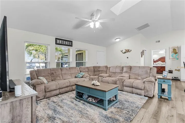 Volume ceilings and extra large space for a great room.