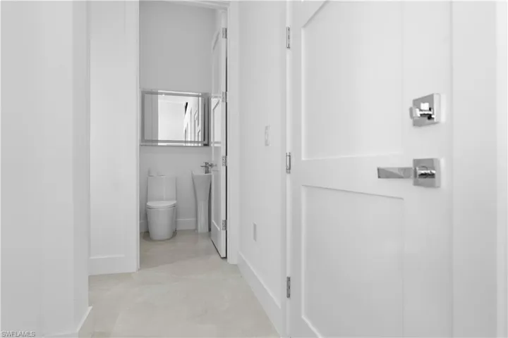 Bathroom featuring baseboards