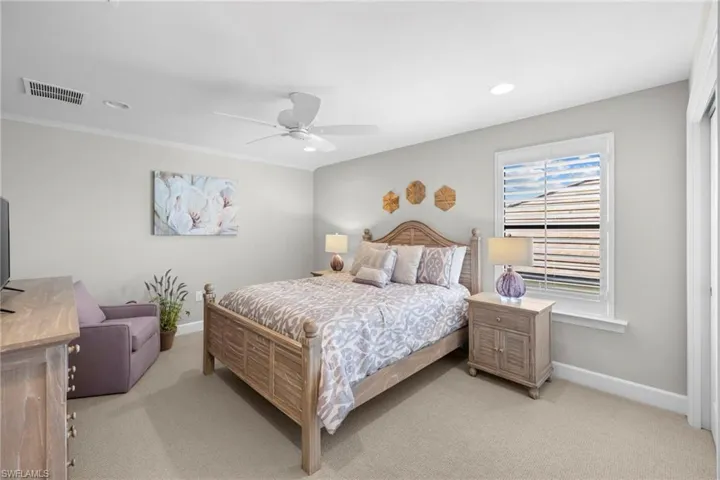 Upstairs Bedroom with light carpet, a ceiling fan, and recessed lighting
