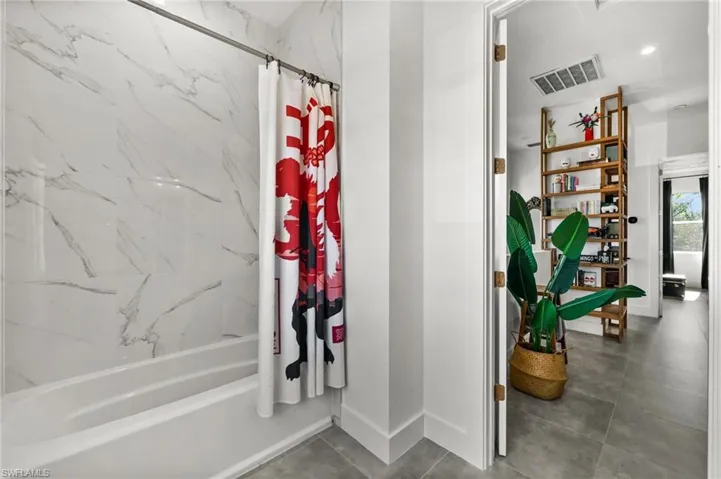 Bathroom featuring shower / bath combo