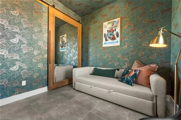 Living room with a barn door