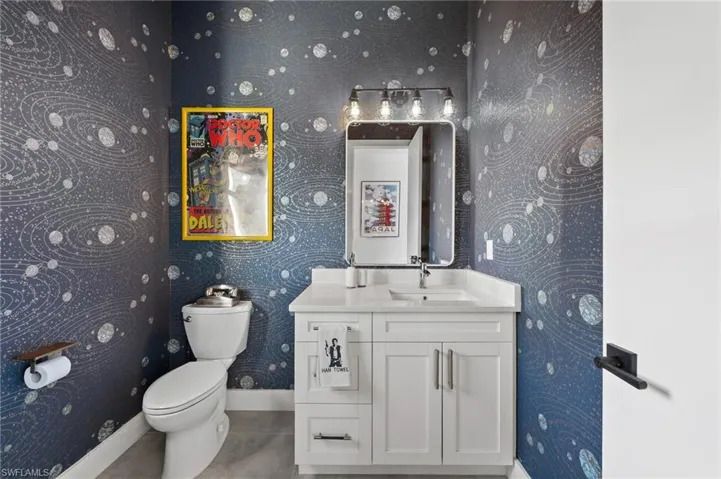 Bathroom with vanity and toilet