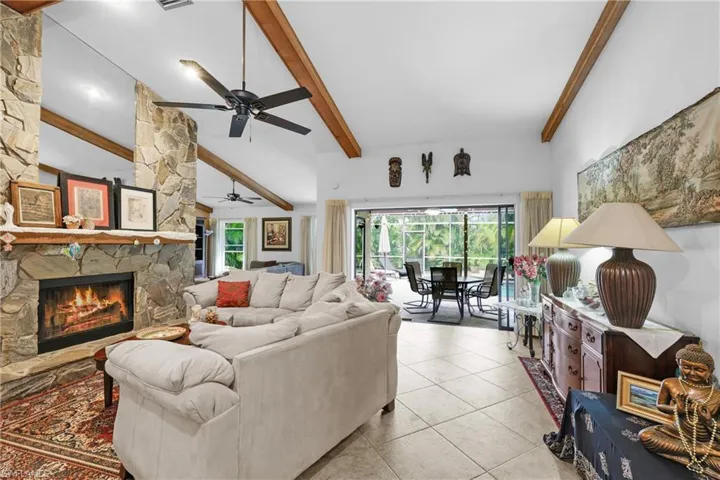 Yes, relax space right here w/High beamed ceiling & Real Fireplace