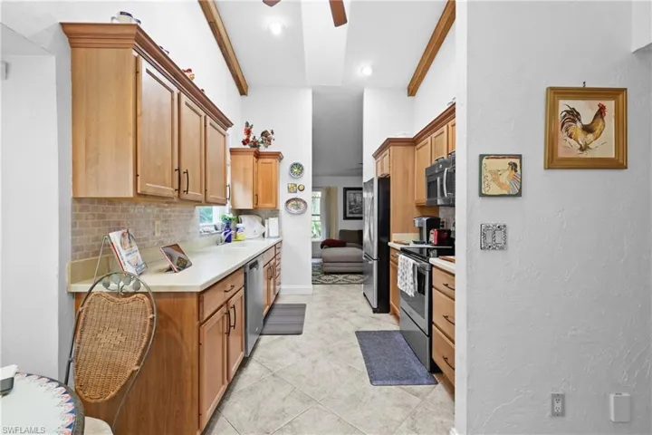 Kitchen view from Breakfast Nook to Family Room