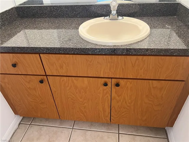 Room details featuring vanity