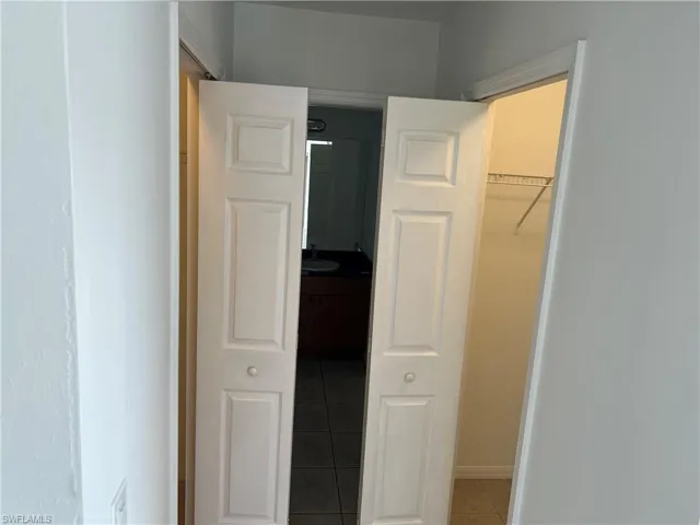 Closet featuring a sink