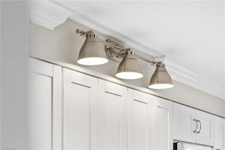 Kitchen view of white cabinets